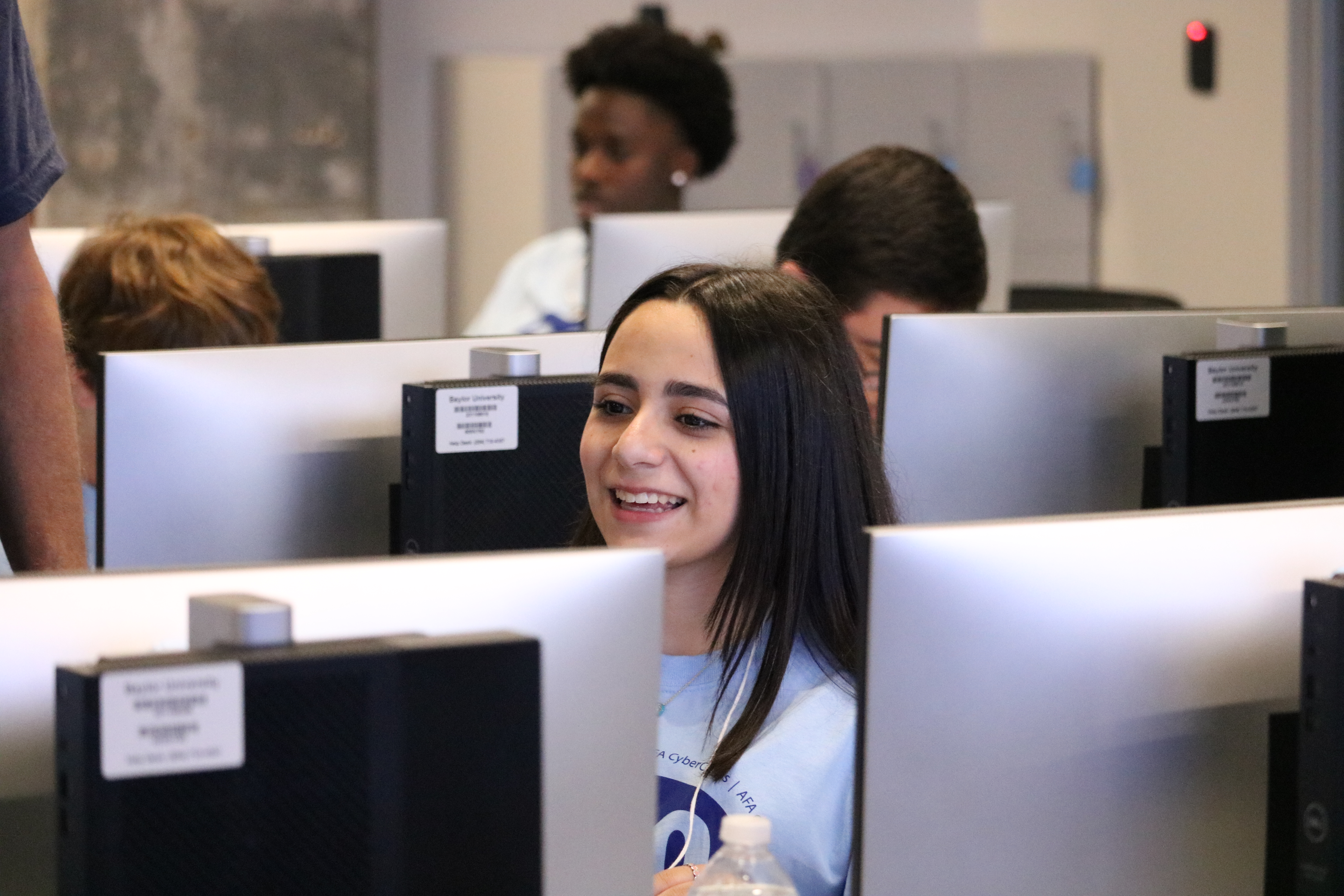 Female student using computer lab